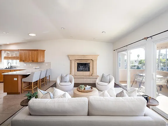 Open living room flowing into the kitchen