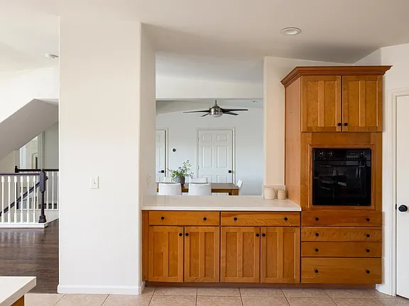 Kitchen backside with built-in oven and pass-through